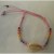 Bracelet tressé rose pâle