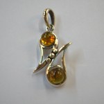 Pendentif ambre tête à tête