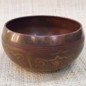 Bol tibétain gravé