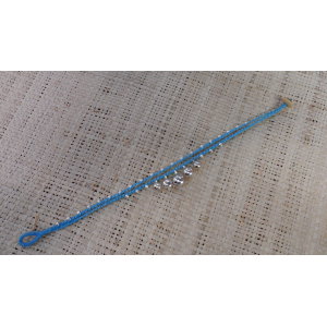 Bracelet de cheville bleu à grelots argentés