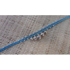 Bracelet de cheville bleu à grelots argentés