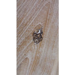 Pendentif flamme tribale