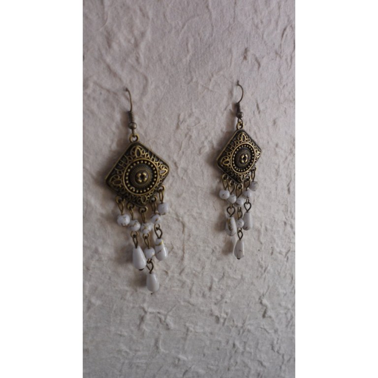 Boucles d'oreilles Hom blancs