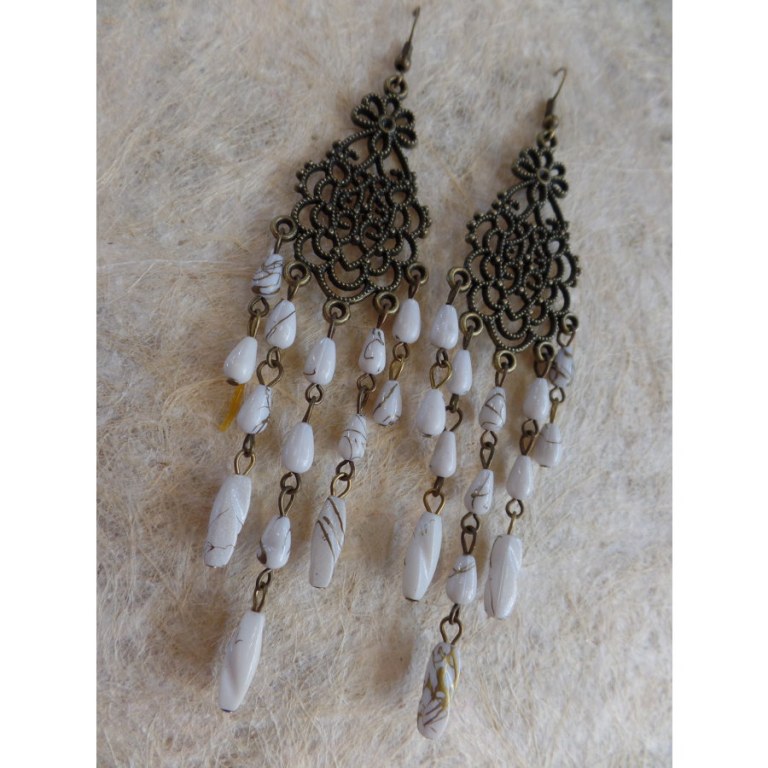 Boucles d'oreilles swi blanches