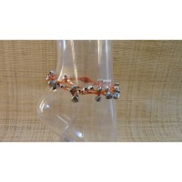 Bracelet de cheville orange à grelots argentés