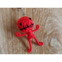 Porte clé motus et bouche cousue rouge