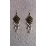 Boucles d'oreilles Hom blancs