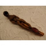 Pipe femme nue jambe repliée