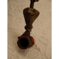 Pipe cobra aux yeux verts