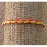 Bracelet rond cuir tressé jaune et rouge