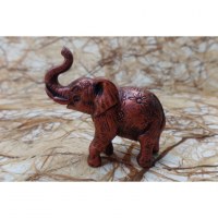 Petit éléphant rouge cuivré